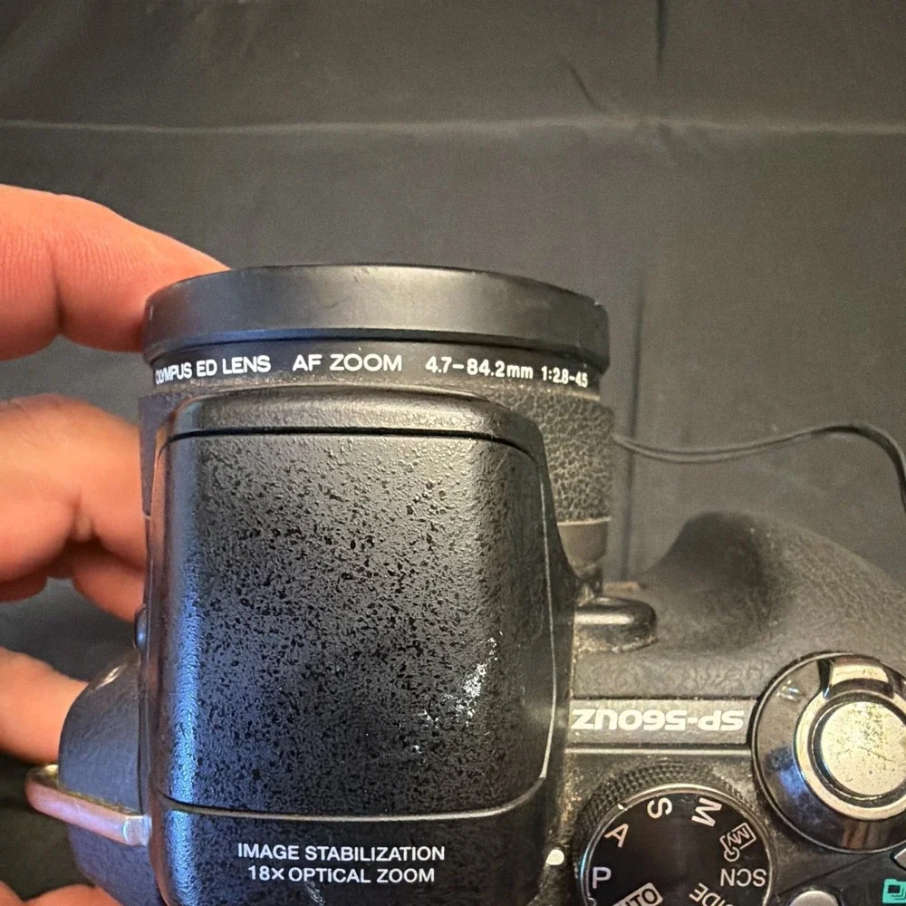 Olympus SP-560UZ 8MP Bridge Camera 18x Optical Zoom Viewfinder Flash Black